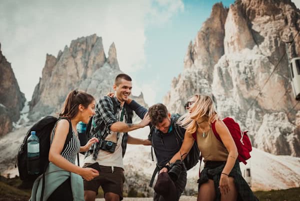 Adventure travelers exploring mountain scenery during trek in the mountains.