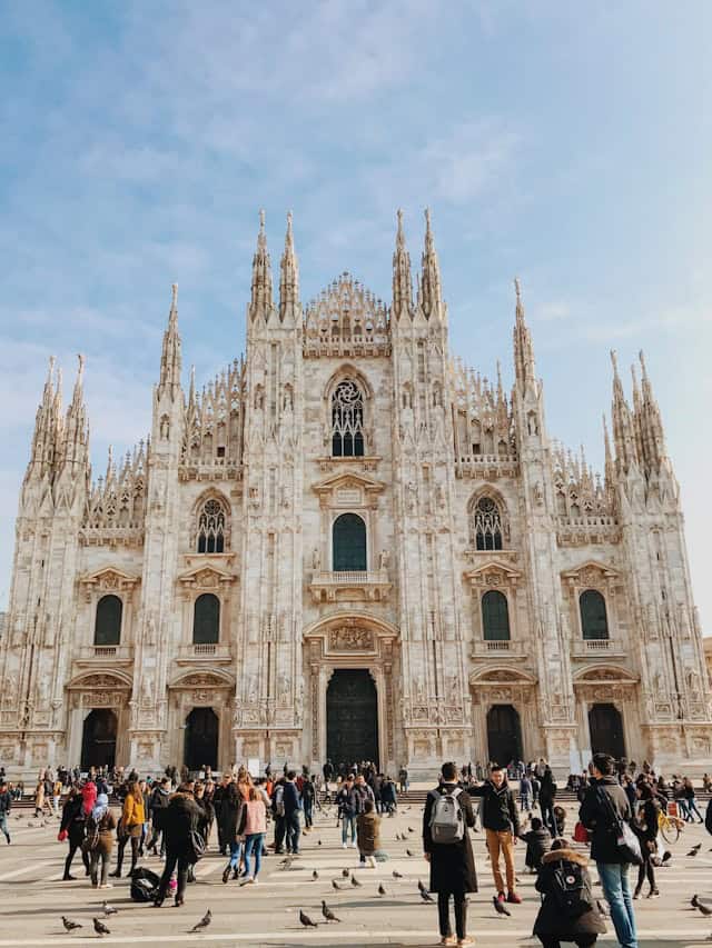 Cathedral of Milan, Italy, famous for its stunning Gothic architecture and intricate marble facade, attracting travelers seeking Italy vacation destinations and cultural travel experiences.
