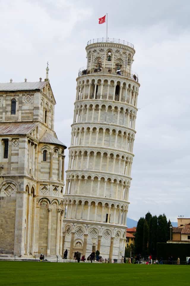 Leaning tower of Pisa in Italy, famous UNESCO World Heritage site, historic Italian landmark, popular travel destination, architecture marvel.