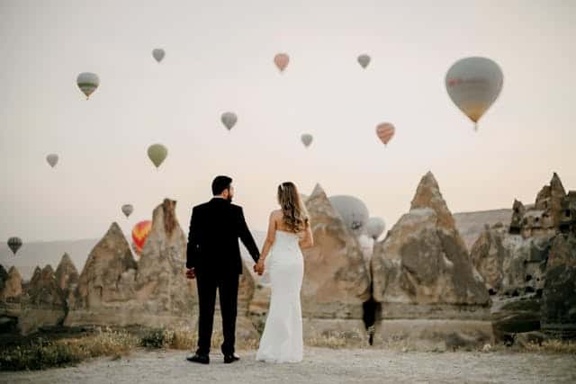 anniversaries-img-02 Hot air balloon wedding in Cappadocia, romantic Destination wedding photography in Turkey, bride and groom in Cappadocia landscape, unique wedding venue, adventure destination wedding inspiration.