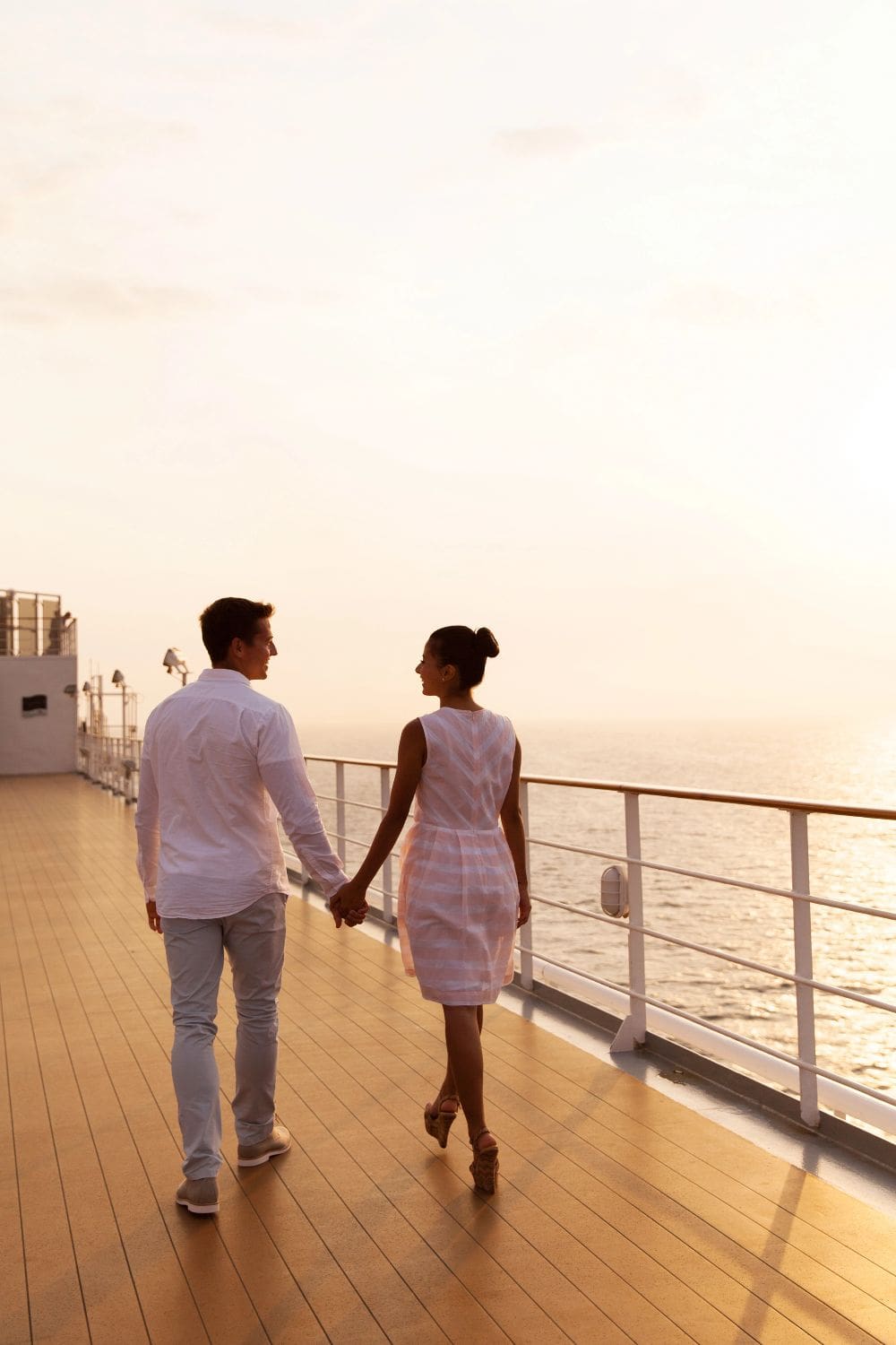 vivid-Headshot Sunset family travel on coastal cliff, enjoying scenic ocean views, exploring nature, outdoor adventure, and vacation memories at the beach.